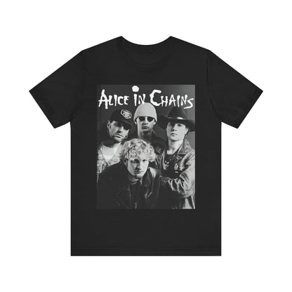 A black graphic t-shirt featuring a black and white photographic portrait of the band Alice In Chains, capturing their iconic grunge look.