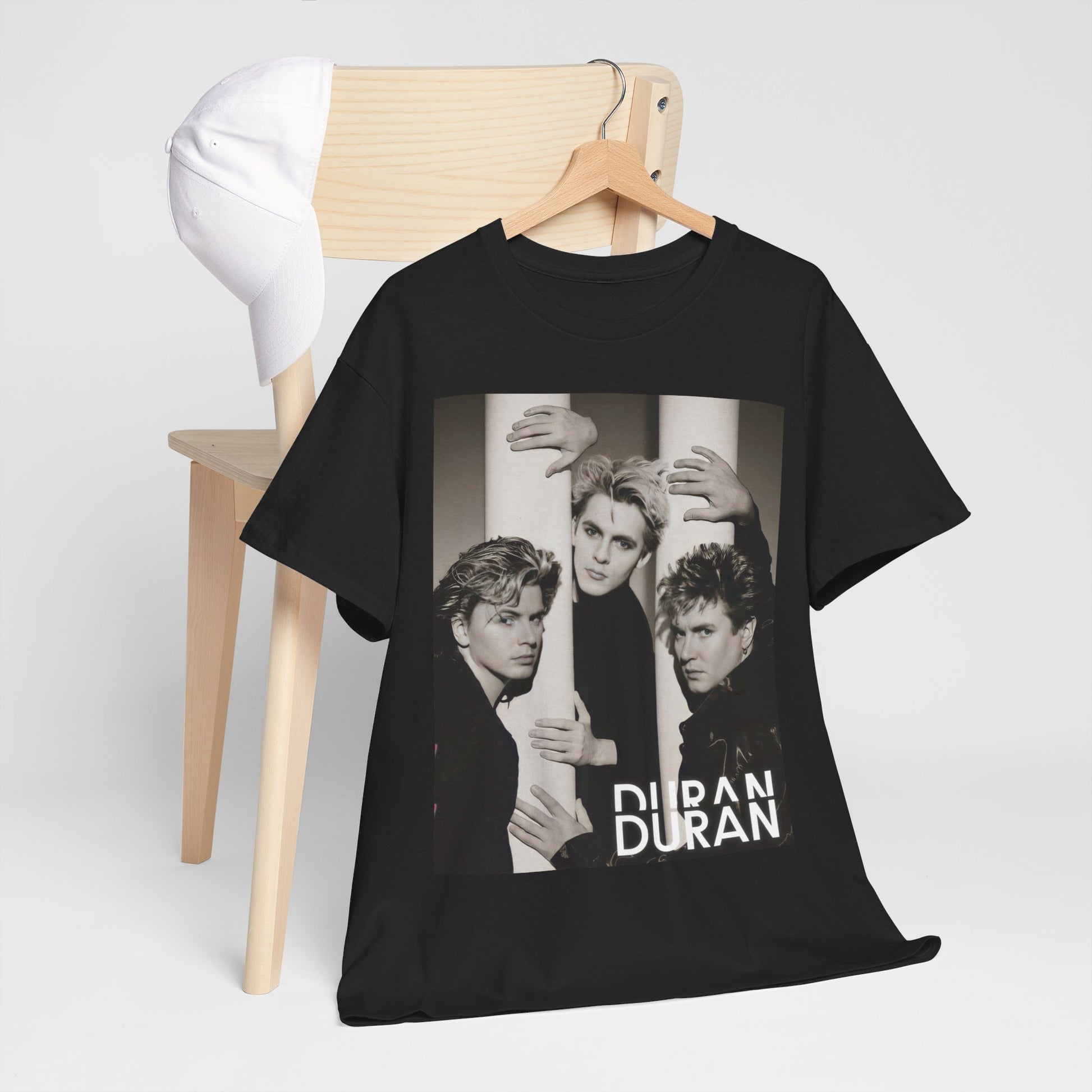 A black graphic t-shirt featuring a graphic related to Duran Duran's 'The Wild Boys' song or era.