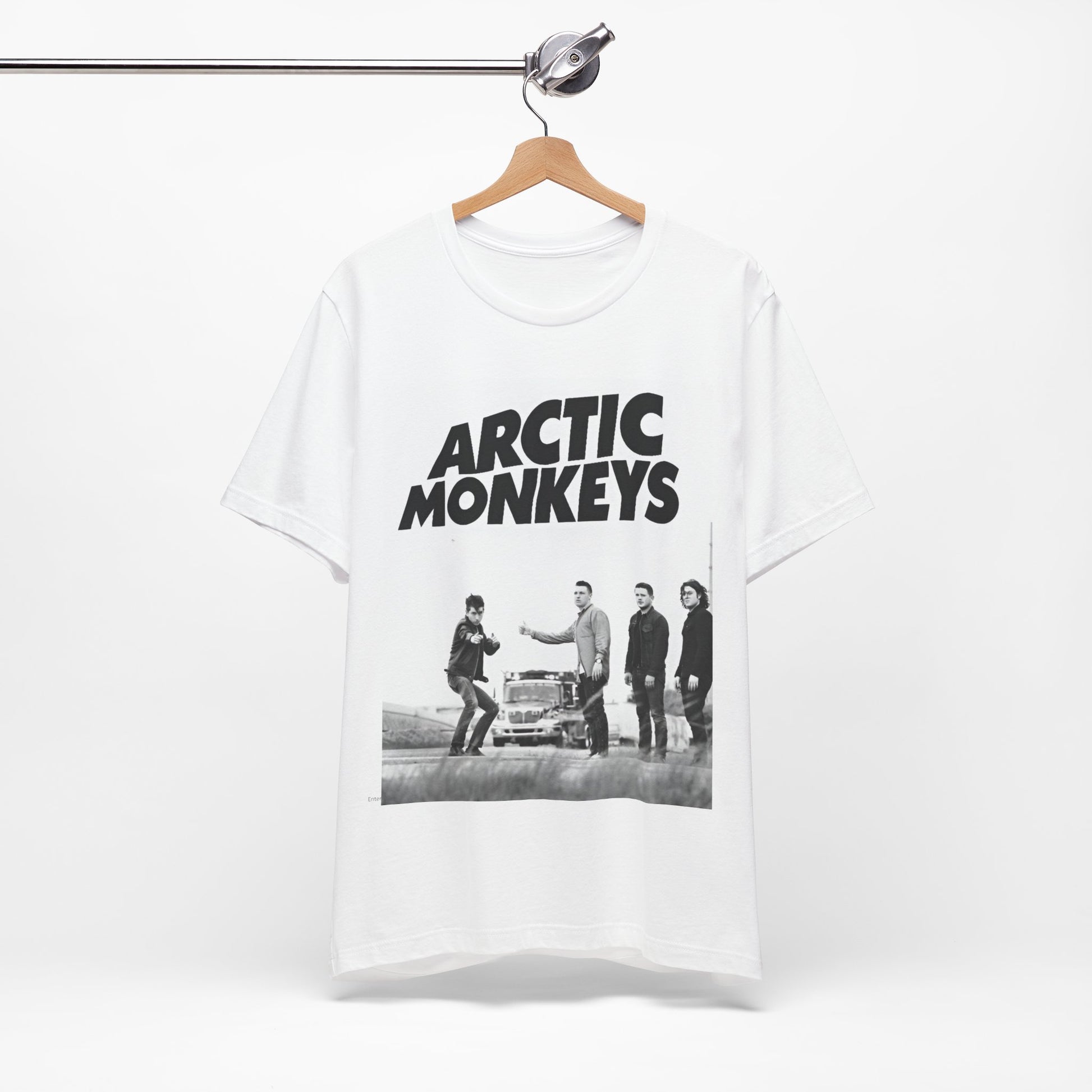 A black graphic t-shirt featuring the Arctic Monkeys logo in black and white.