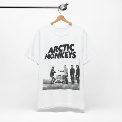 A black graphic t-shirt featuring the Arctic Monkeys logo in black and white.