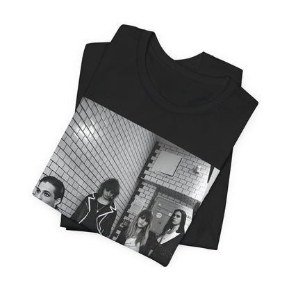 A black graphic t-shirt featuring a black and white graphic or photo of Maneskin in a backstage setting.