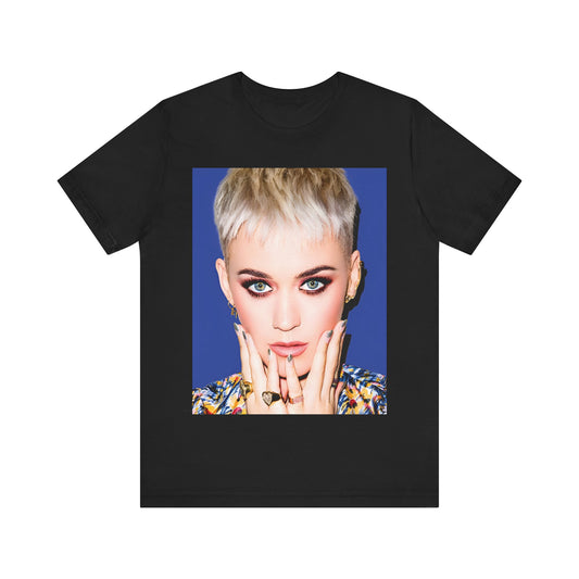 A black graphic t-shirt featuring a graphic of Katy Perry as a global pop phenomenon.