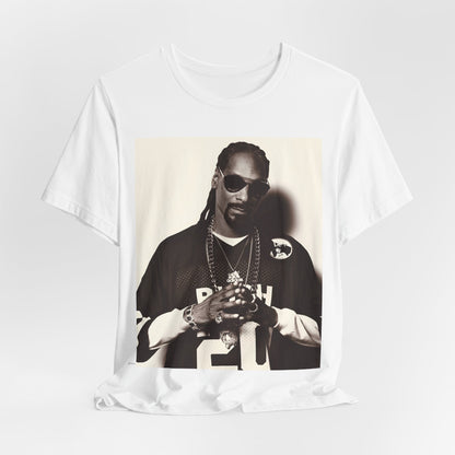 A black graphic t-shirt featuring a black and white, monochrome graphic or photo of Snoop Dogg in an OG style.
