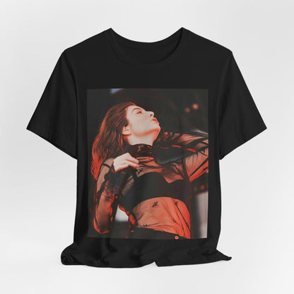 A black graphic t-shirt featuring a graphic of Lorde emphasizing raw emotion.