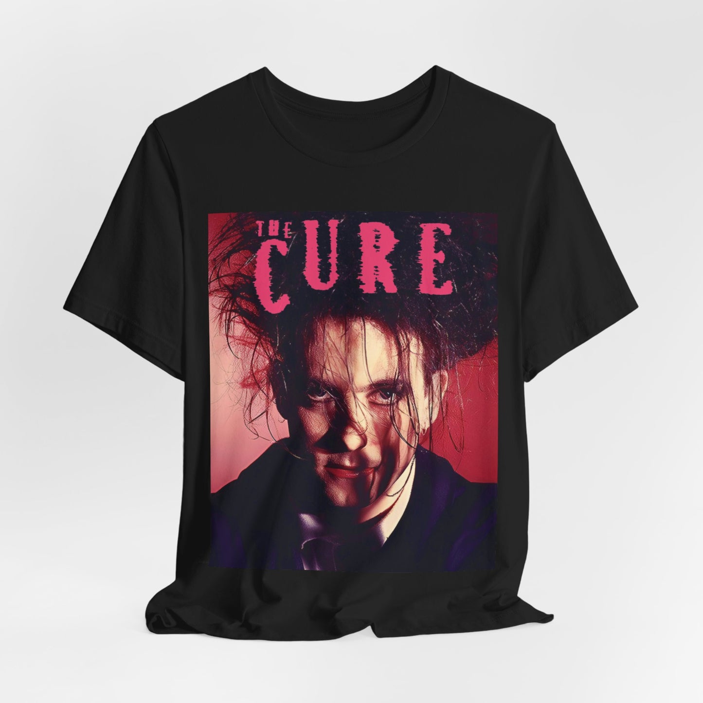 A black graphic t-shirt featuring a vintage graphic related to The Cure's 'Just Like Heaven' song or era.