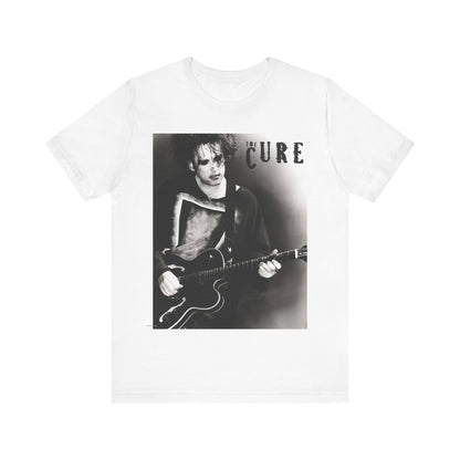 A black graphic t-shirt featuring a vintage goth rock graphic of The Cure.