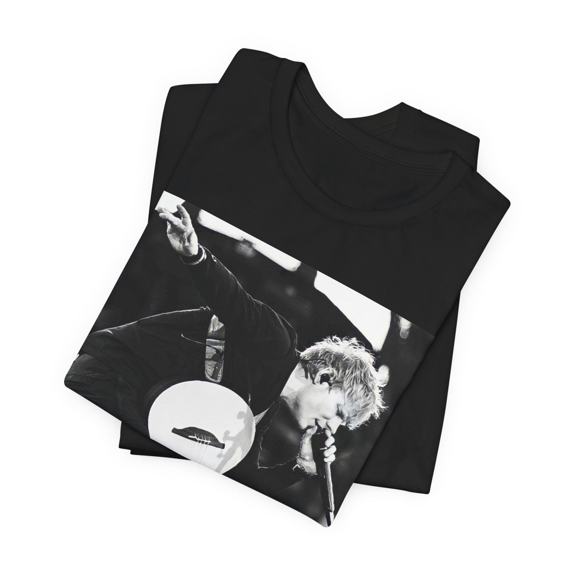 A black graphic t-shirt featuring a vintage graphic of Ed Sheeran performing live.