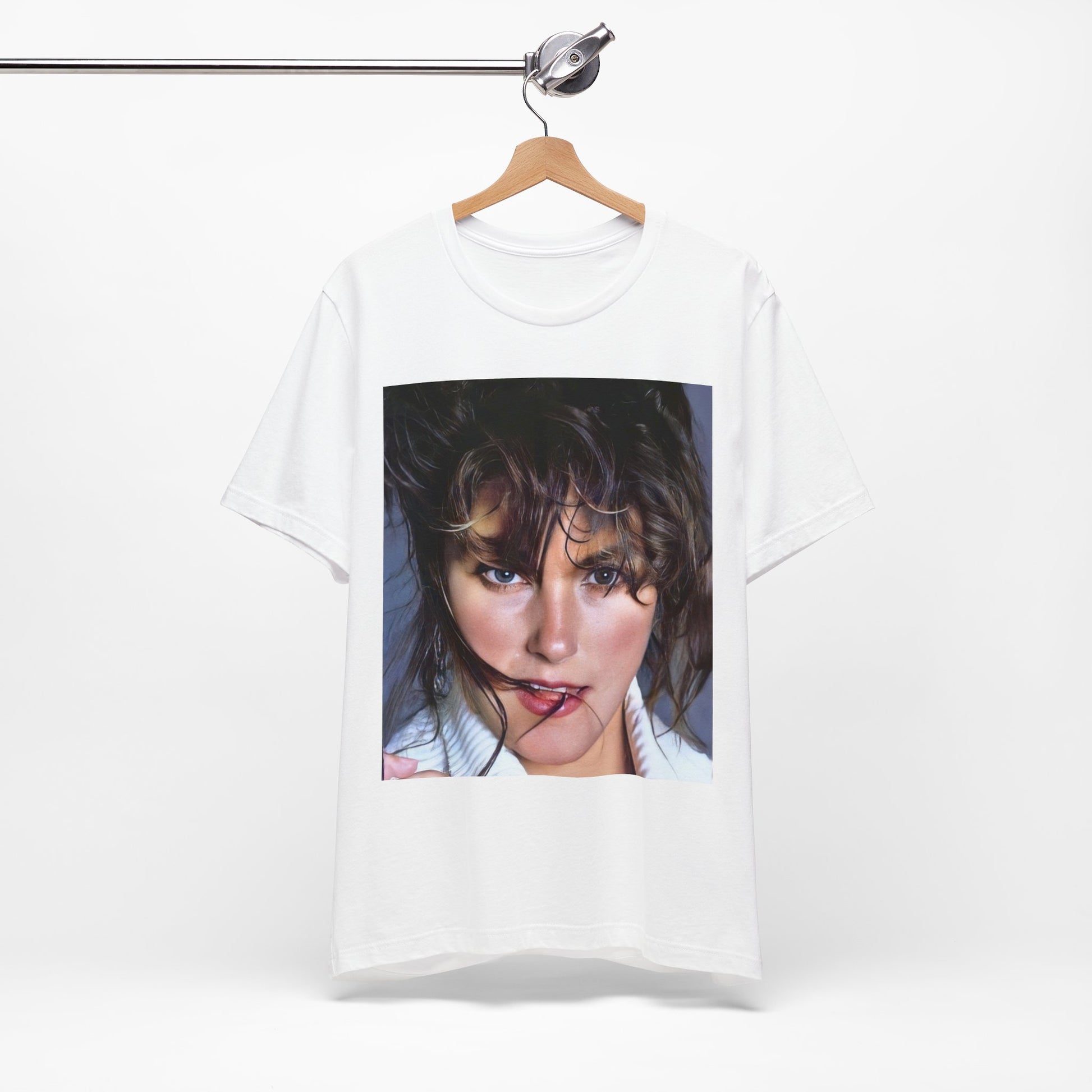 A black graphic t-shirt featuring an 80s style graphic of Laura Branigan.