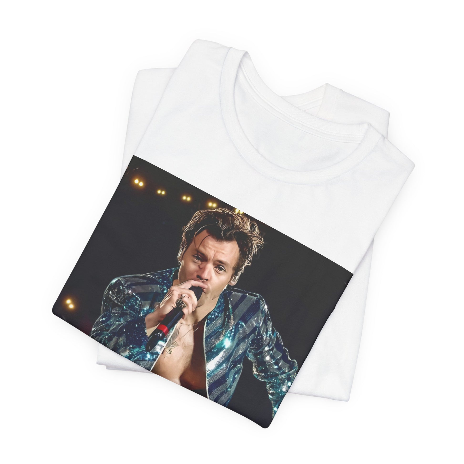 A black graphic t-shirt featuring a graphic related to Harry Styles' 'Adore You' song or era.
