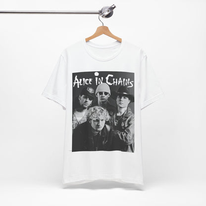 A black graphic t-shirt featuring a black and white photographic portrait of the band Alice In Chains, capturing their iconic grunge look.