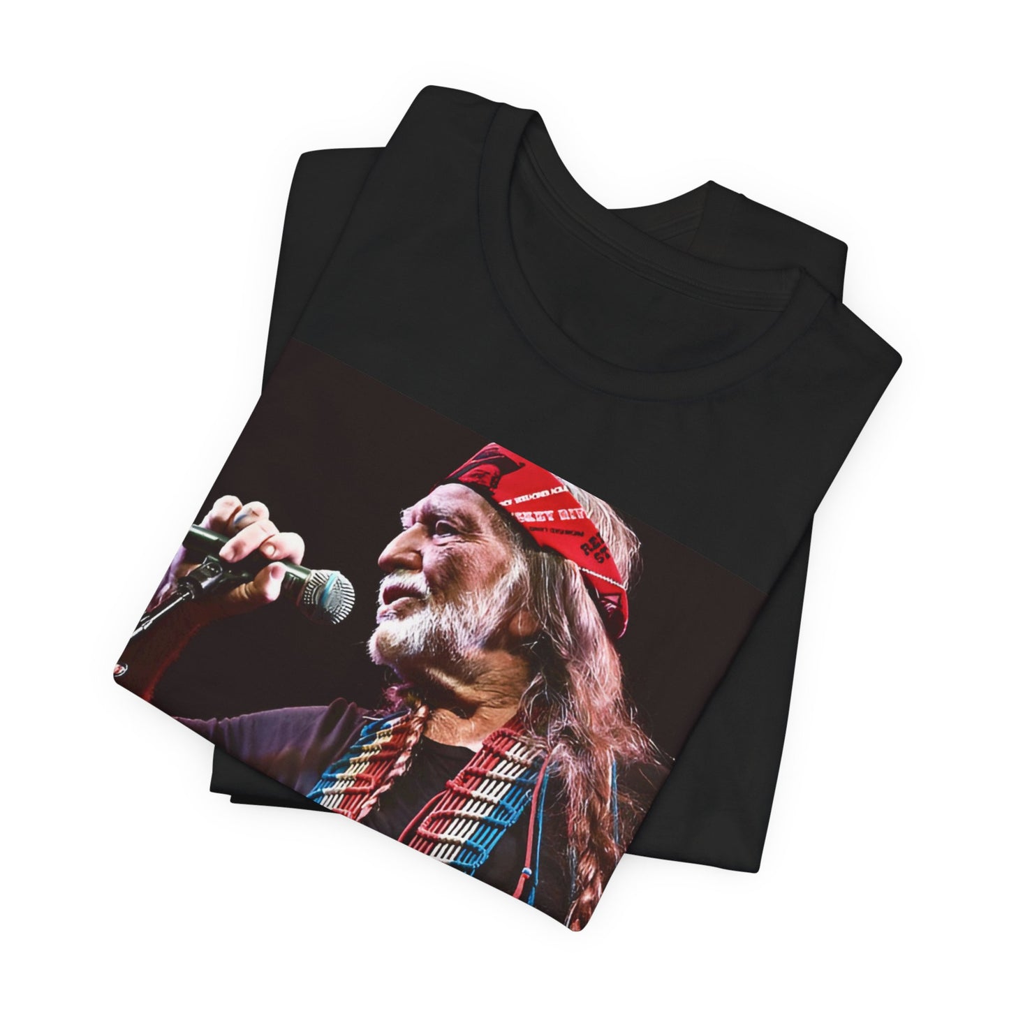 A black graphic t-shirt featuring a graphic of Willie Nelson with his iconic long hair and bandana.