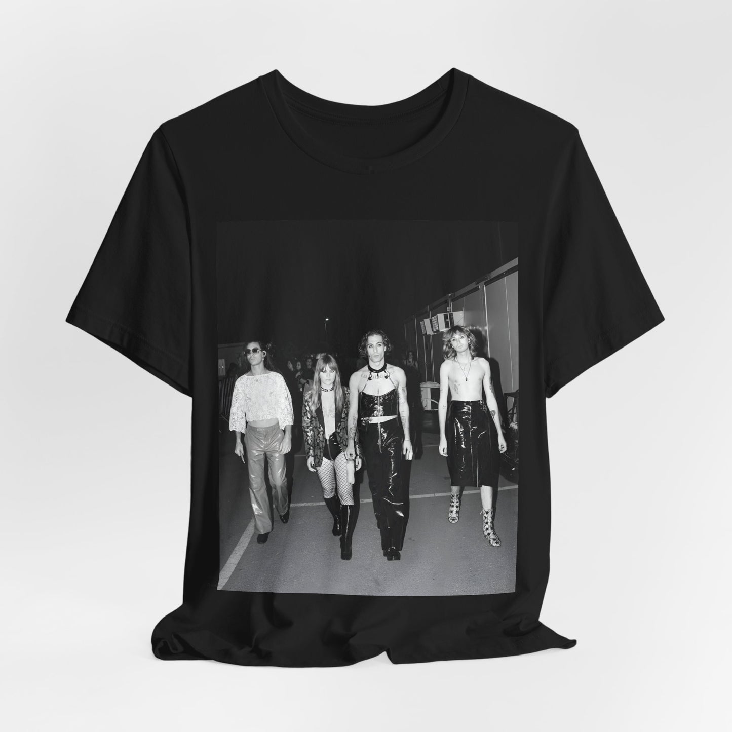 A black graphic t-shirt featuring a black and white, monochrome graphic or photo of Maneskin.