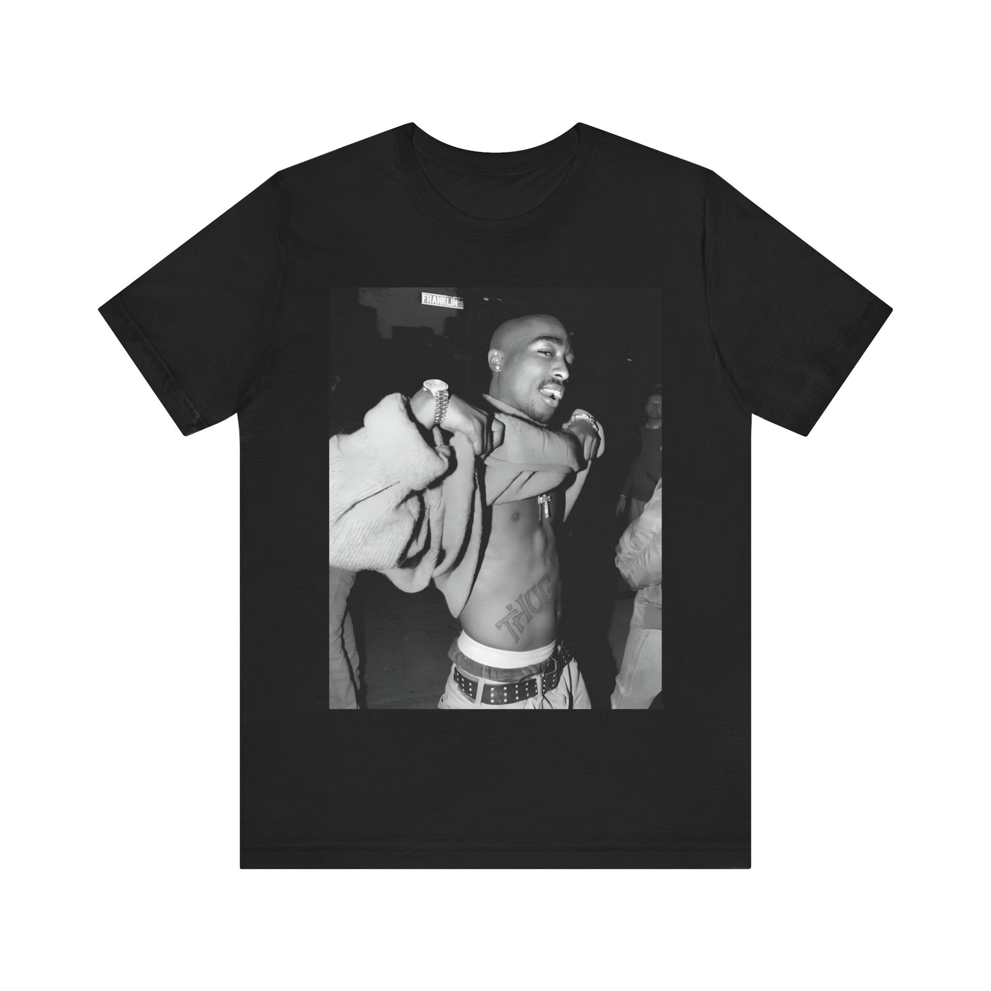 A black graphic t-shirt featuring a vintage hip hop icon graphic of Tupac.