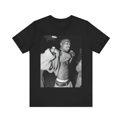 A black graphic t-shirt featuring a vintage hip hop icon graphic of Tupac.