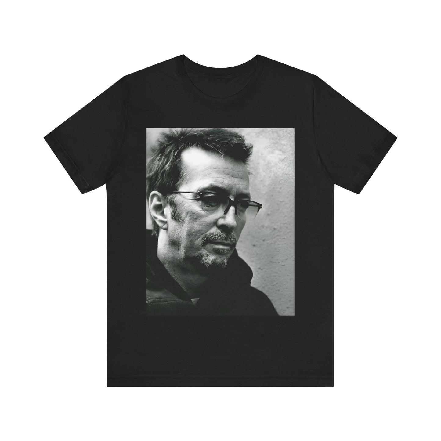 A black graphic t-shirt featuring a black and white, monochrome graphic or photo of Eric Clapton.