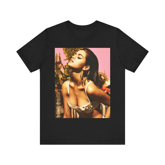A black graphic t-shirt featuring a graphic of Selena Gomez emphasizing her timeless beauty.