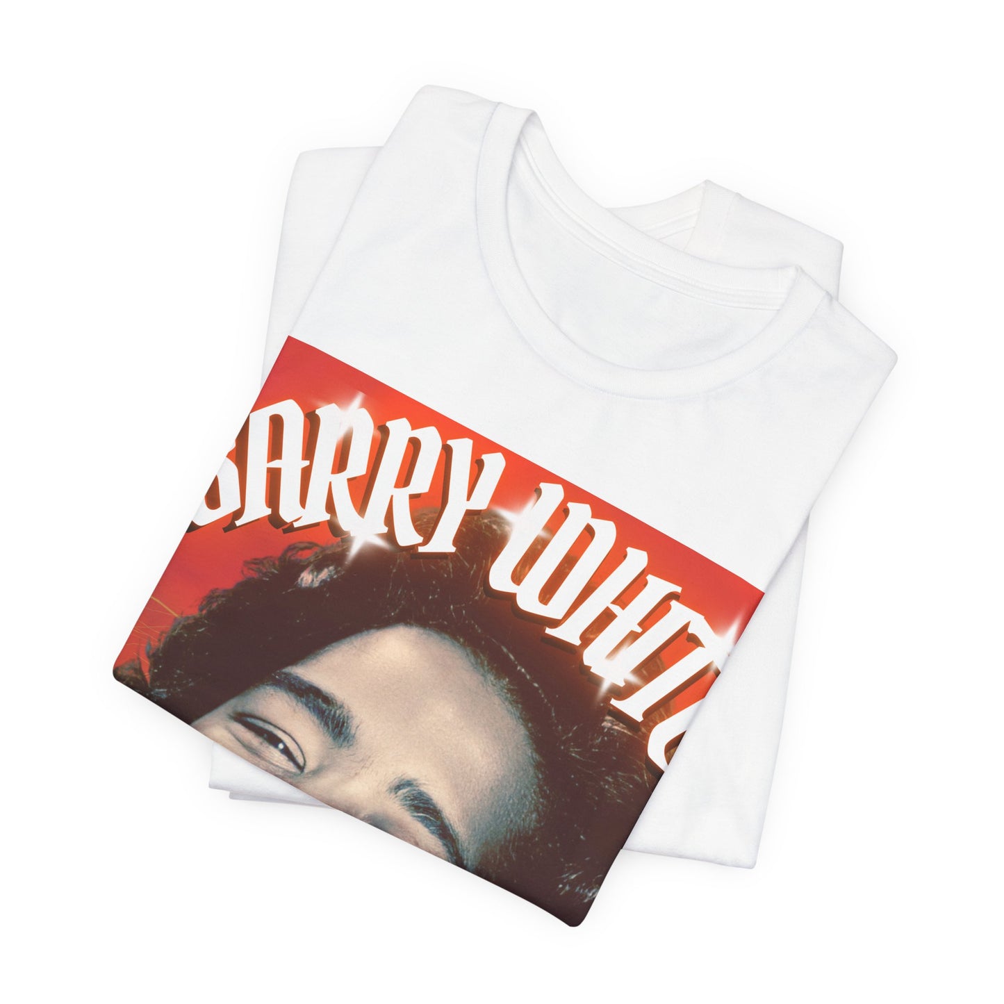 A black graphic t-shirt featuring a graphic of Barry White, emphasizing his iconic soulful presence from the 1970s.