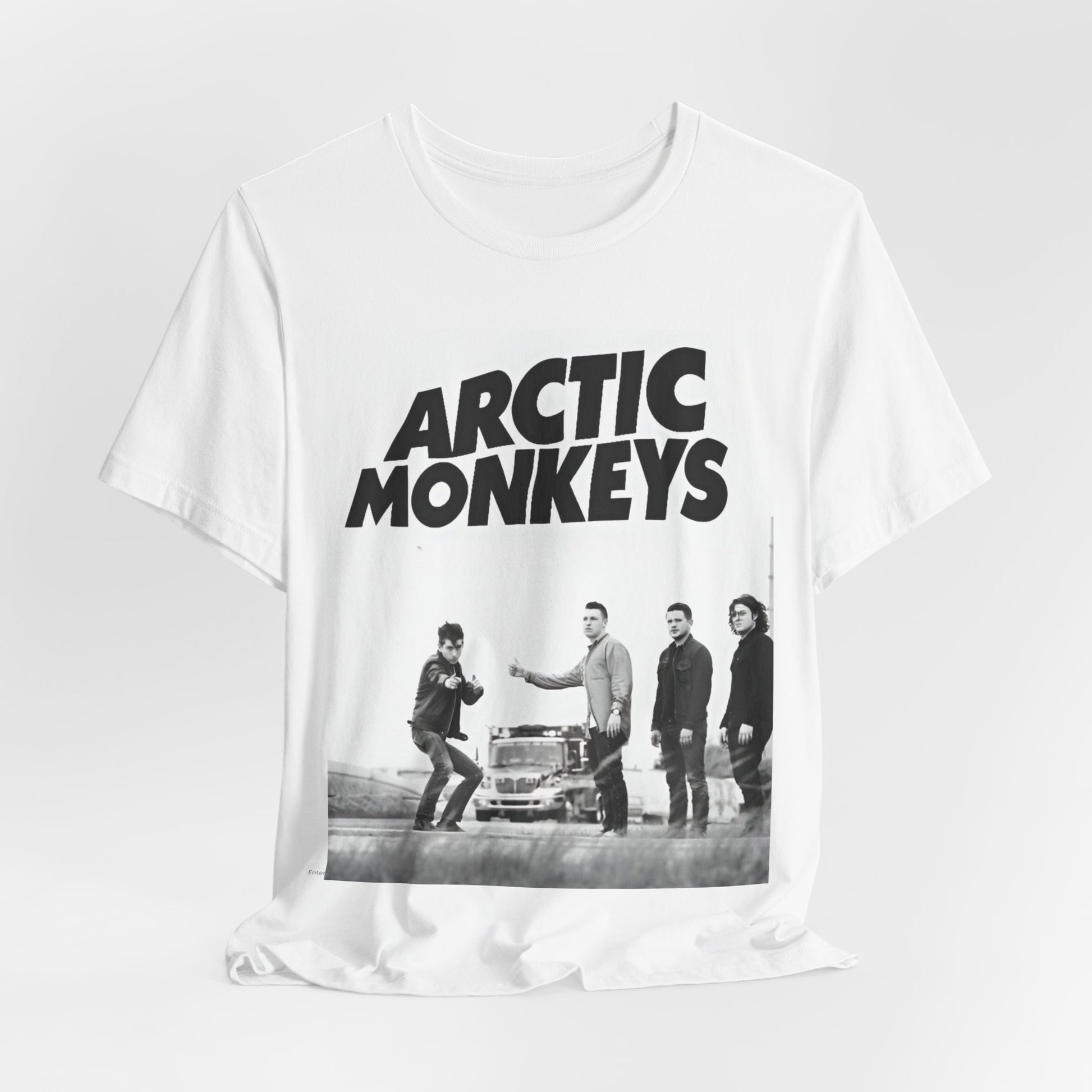 A black graphic t-shirt featuring the Arctic Monkeys logo in black and white.