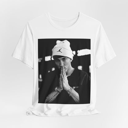 A black graphic t-shirt featuring a black and white portrait photo of Eminem.