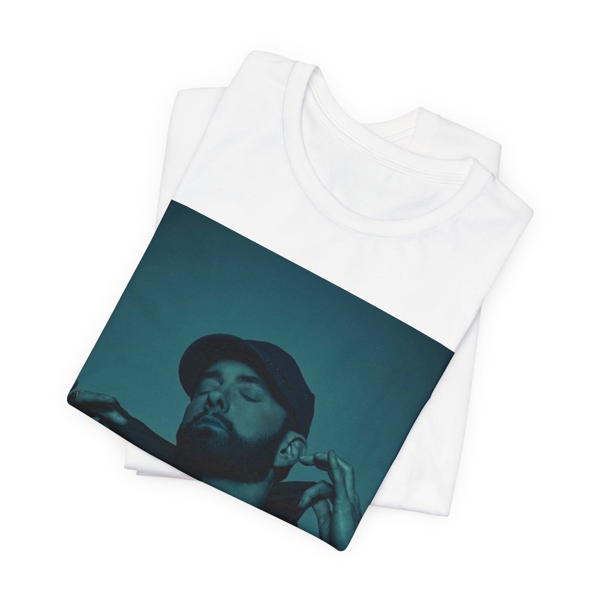 A black graphic t-shirt featuring a graphic of Eminem as a 'Rap God'.