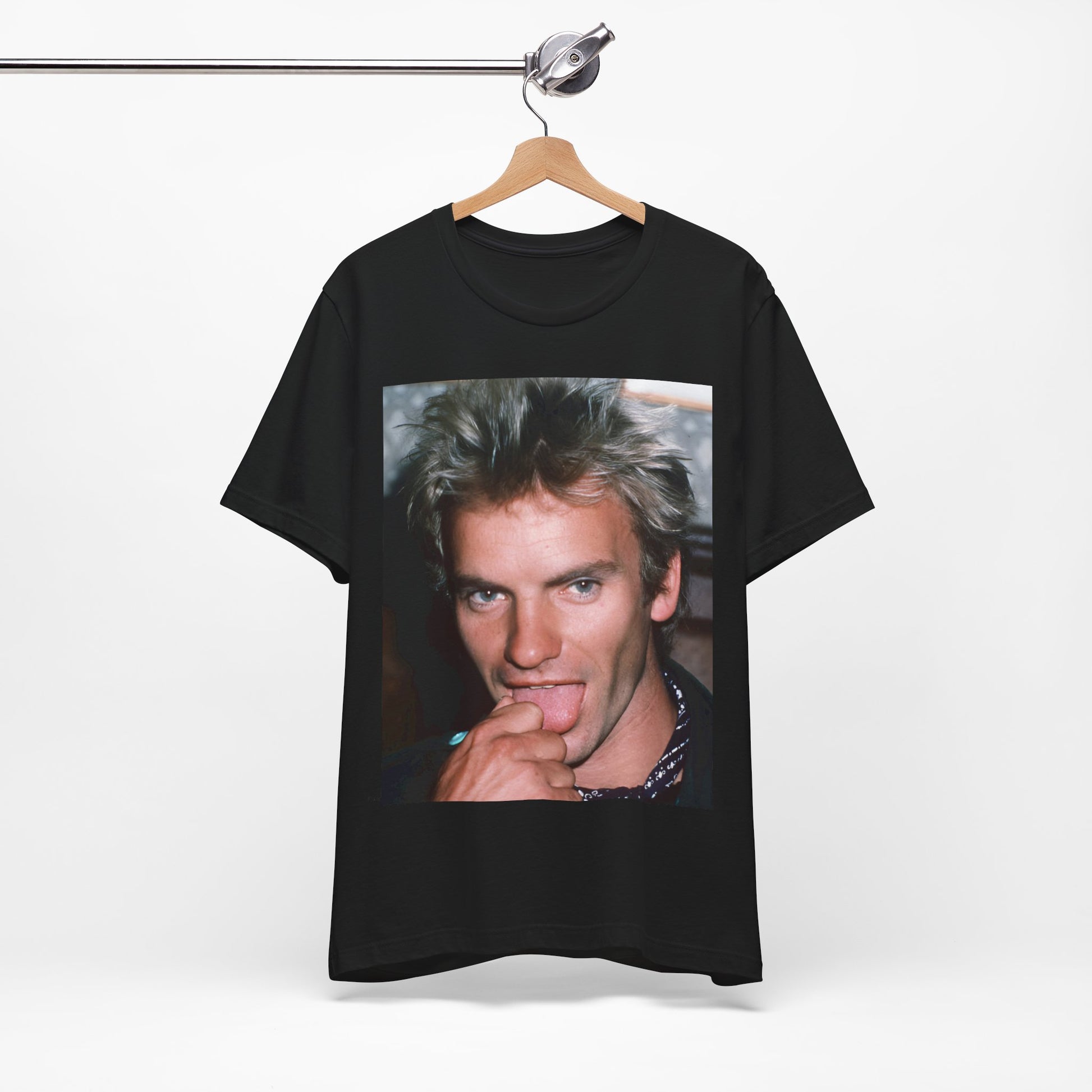A black graphic t-shirt featuring an 80s new wave aesthetic graphic of Sting.