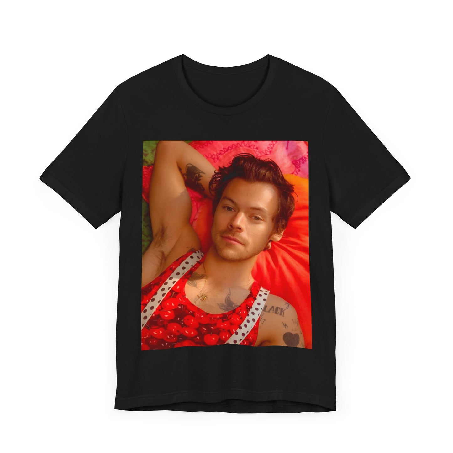 A black graphic t-shirt featuring a graphic of Harry Styles with a chill pop vibe.