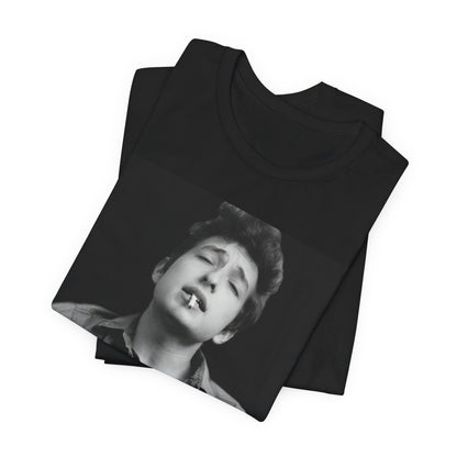 A black graphic t-shirt featuring a photo of Bob Dylan with his acoustic guitar.