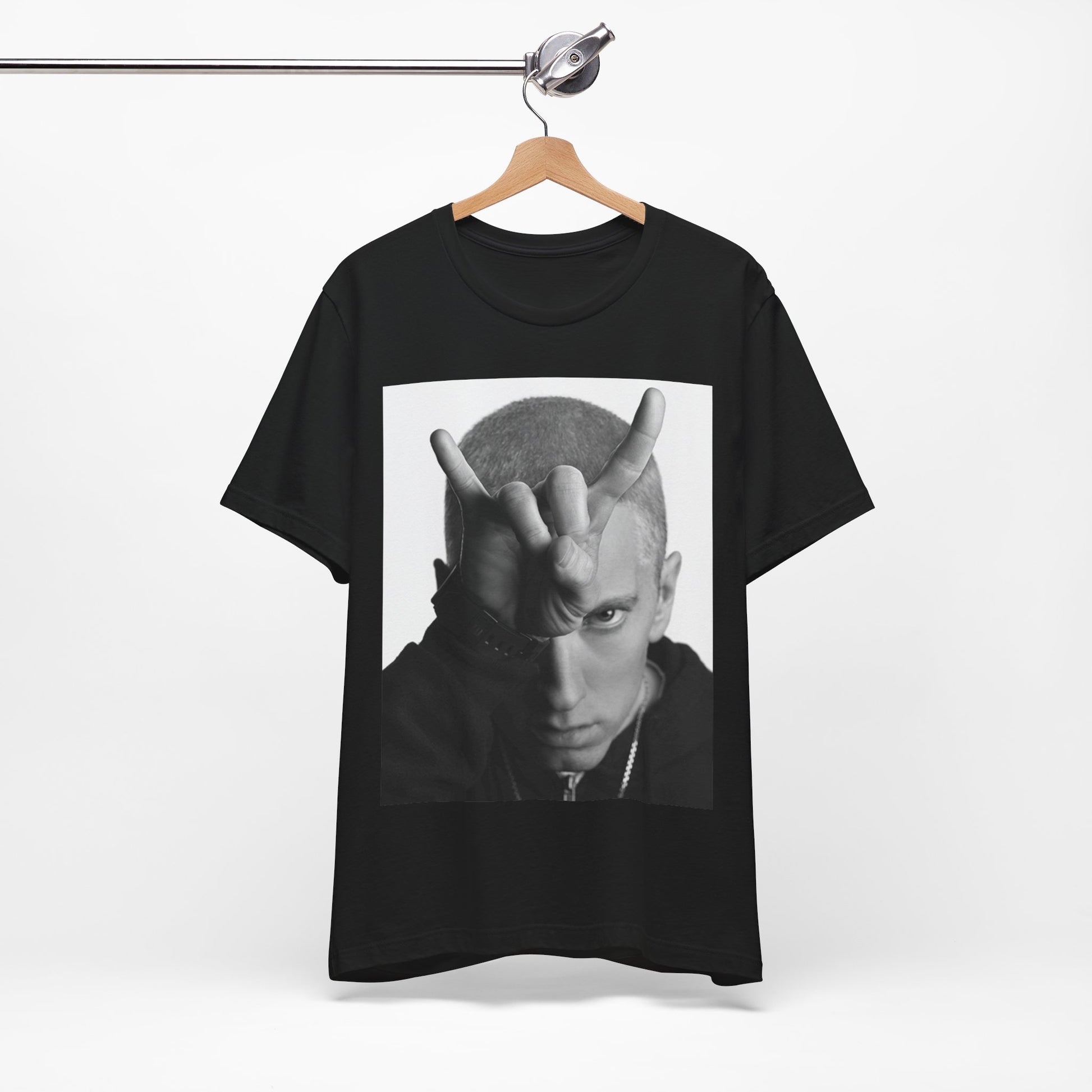 A black graphic t-shirt featuring a graphic related to Eminem's 'My Name Is' song or era.