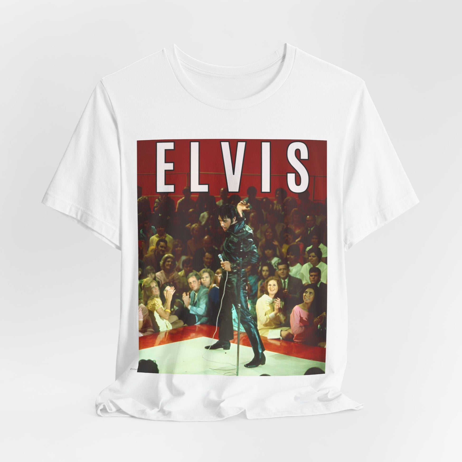 A black graphic t-shirt featuring a retro graphic related to an Elvis Presley special concert.