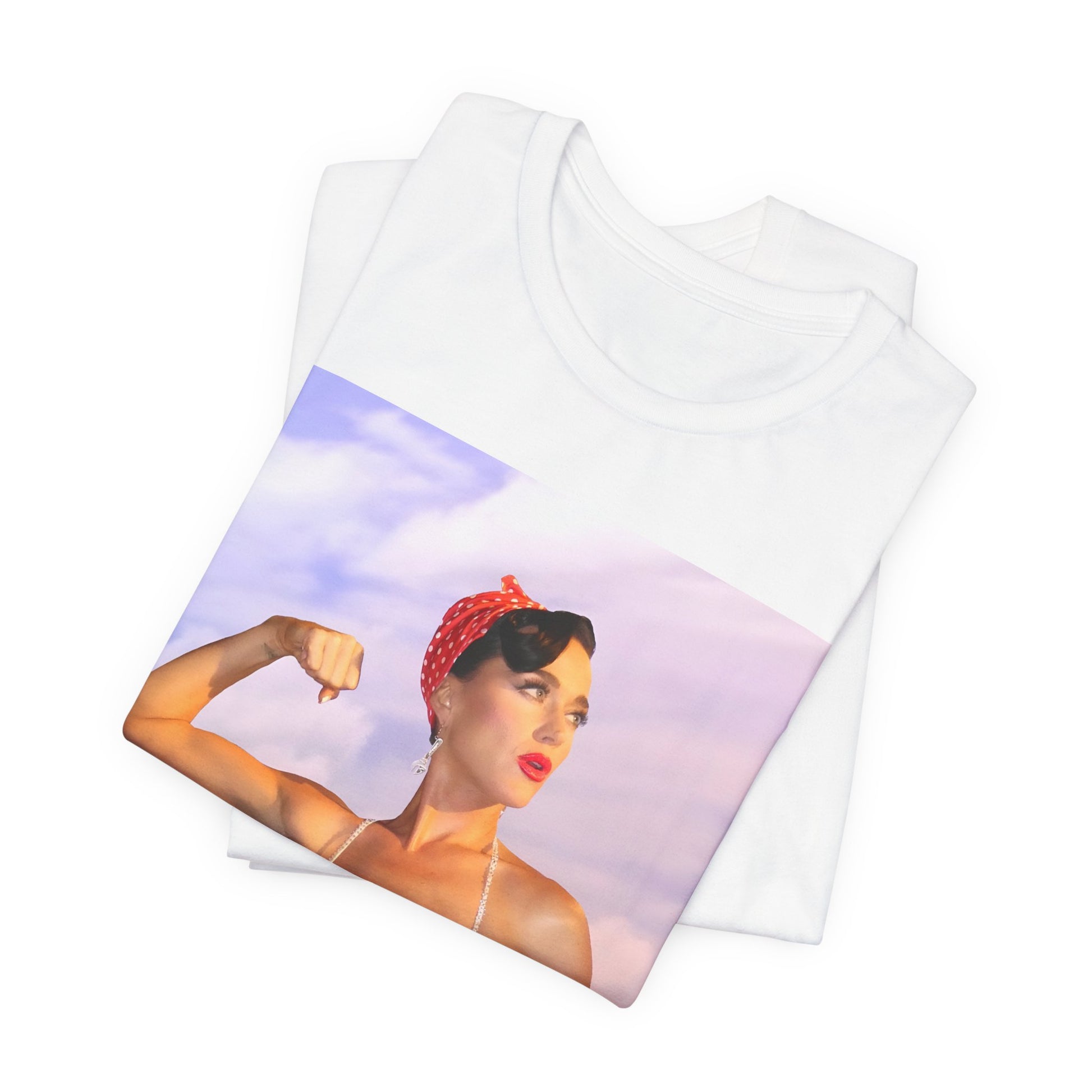 A black graphic t-shirt featuring a bold graphic of Katy Perry as a pop superstar.