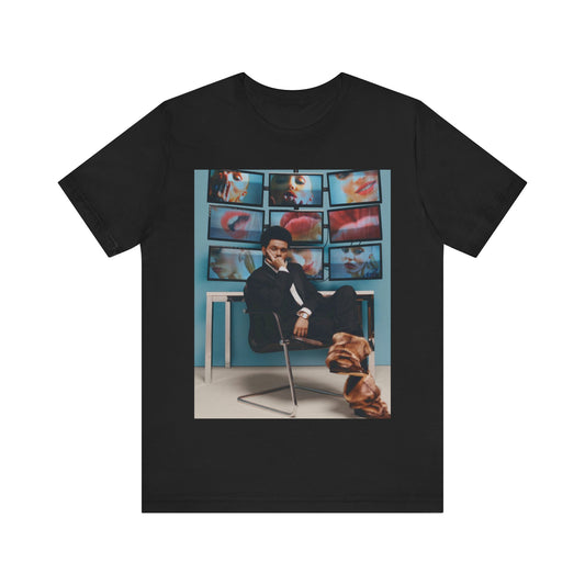 A black graphic t-shirt featuring an aesthetic graphic of The Weeknd.