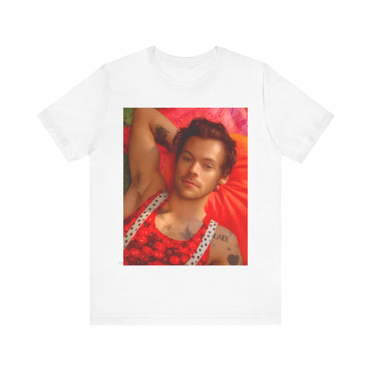 A black graphic t-shirt featuring a graphic of Harry Styles with a chill pop vibe.