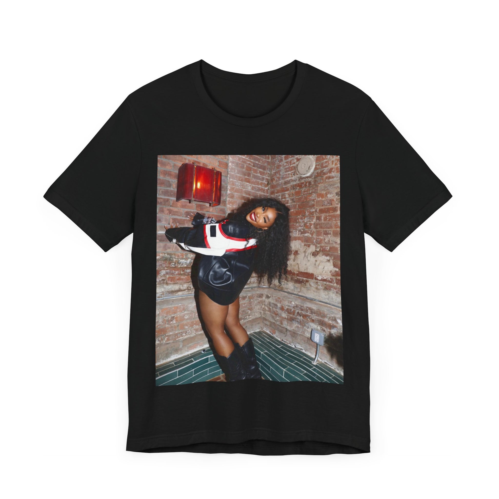 A black graphic t-shirt featuring a graphic of SZA as a TDE Queen R&B icon.