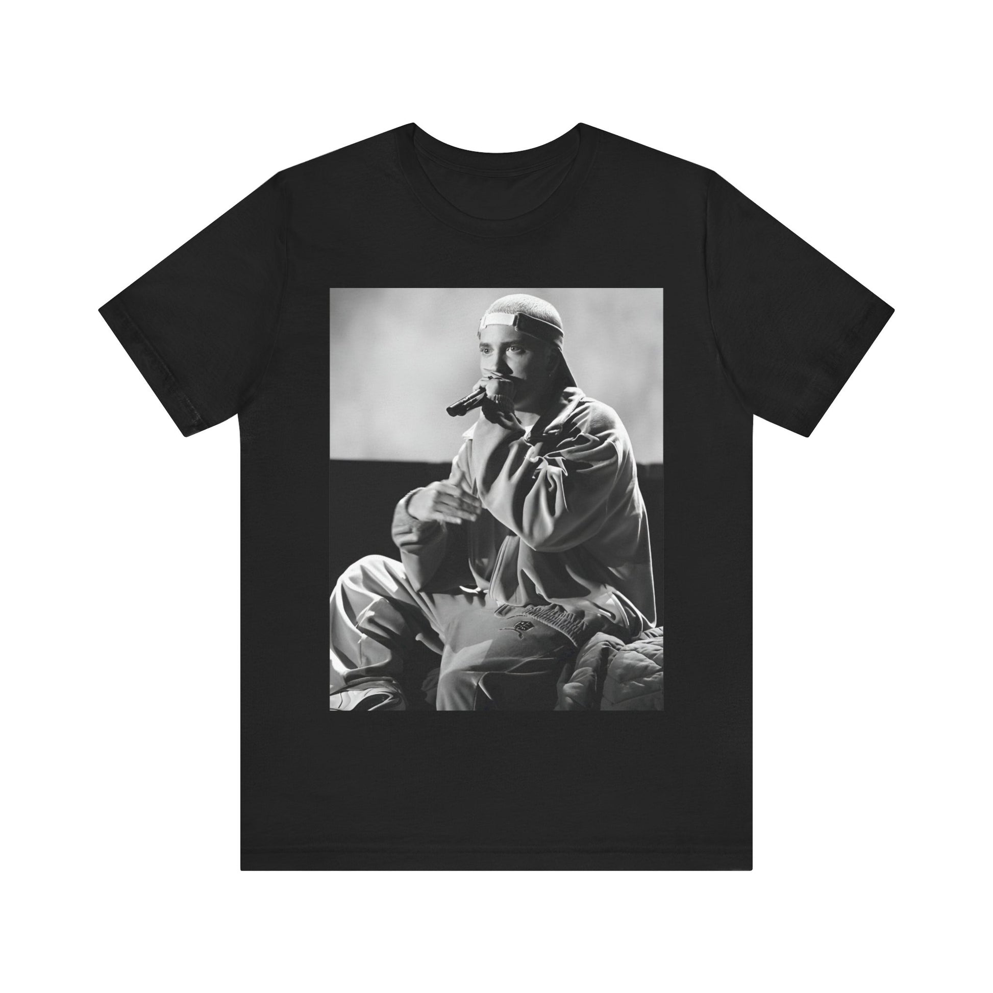 A black graphic t-shirt featuring a black and white graphic of Eminem as a 'Rap Messiah'.