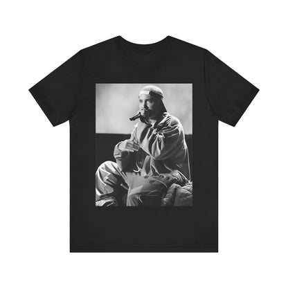 A black graphic t-shirt featuring a black and white graphic of Eminem as a 'Rap Messiah'.