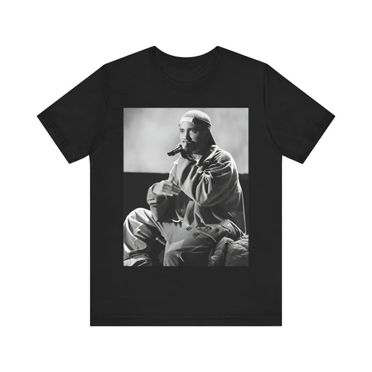 A black graphic t-shirt featuring a black and white graphic of Eminem as a 'Rap Messiah'.