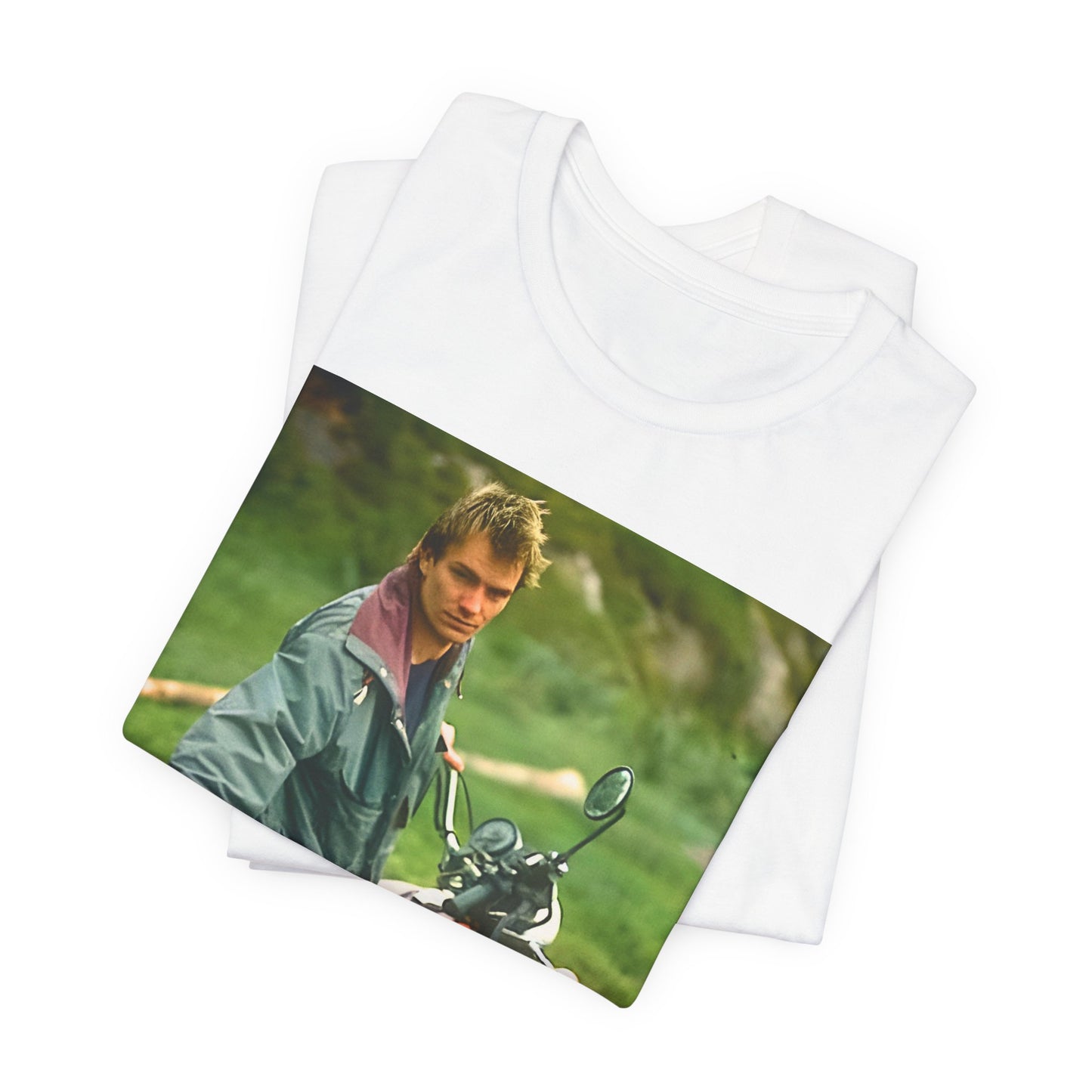 A black graphic t-shirt featuring a graphic of Sting from The Police with a motorcycle theme.