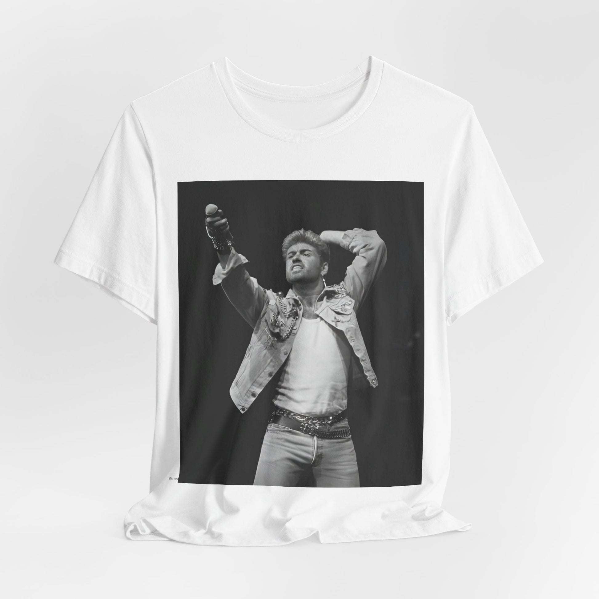A black graphic t-shirt featuring a graphic or photo of George Michael performing live on stage.