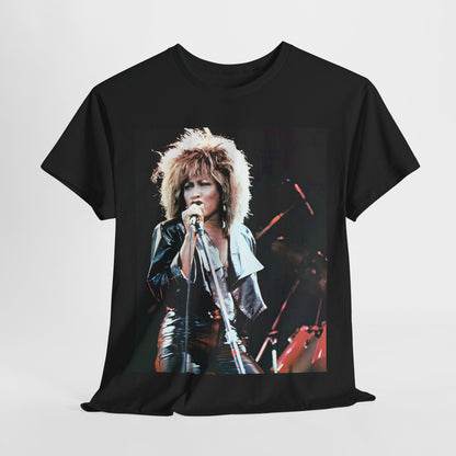 A black graphic t-shirt featuring a 90s graphic or photo of Tina Turner performing live on stage.