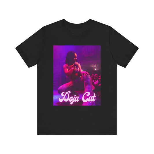 A black graphic t-shirt featuring a glamorous graphic or photo of Doja Cat performing on stage.