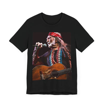A black graphic t-shirt featuring a graphic of Willie Nelson with his iconic long hair and bandana.