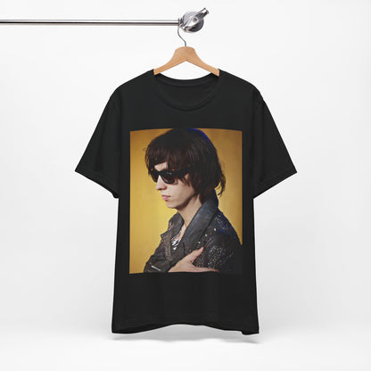 A black graphic t-shirt featuring a retro graphic related to The Strokes' 'Is This It' album era.