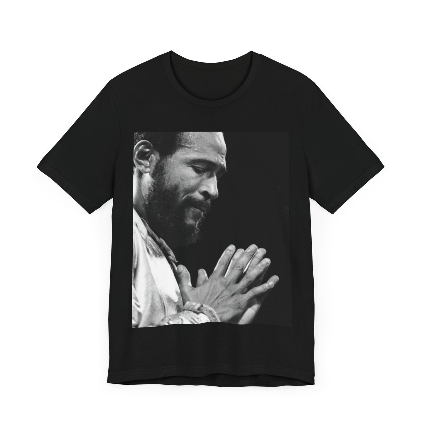 A black graphic t-shirt featuring a 70s graphic of Marvin Gaye emphasizing his soulful voice.