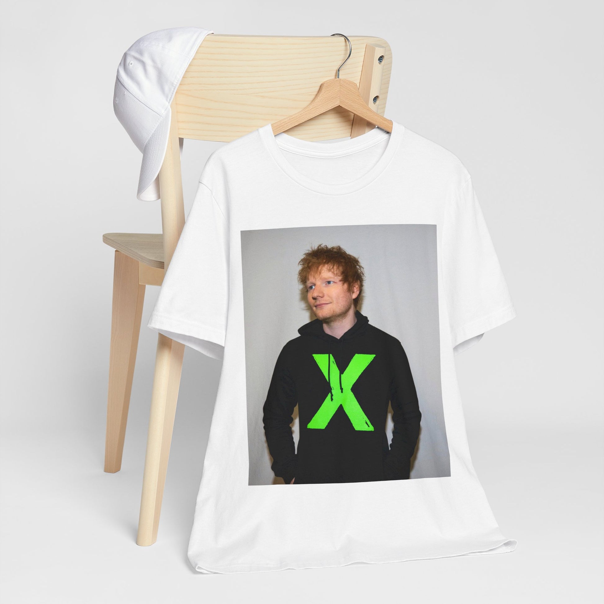 A black graphic t-shirt featuring an aesthetic graphic of Ed Sheeran related to his album 'X'.