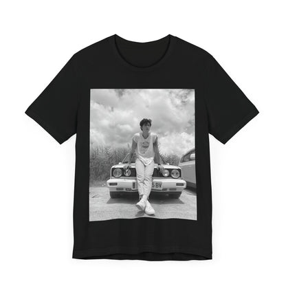 A black graphic t-shirt featuring a graphic of Shawn Mendes in an iconic tank top look.