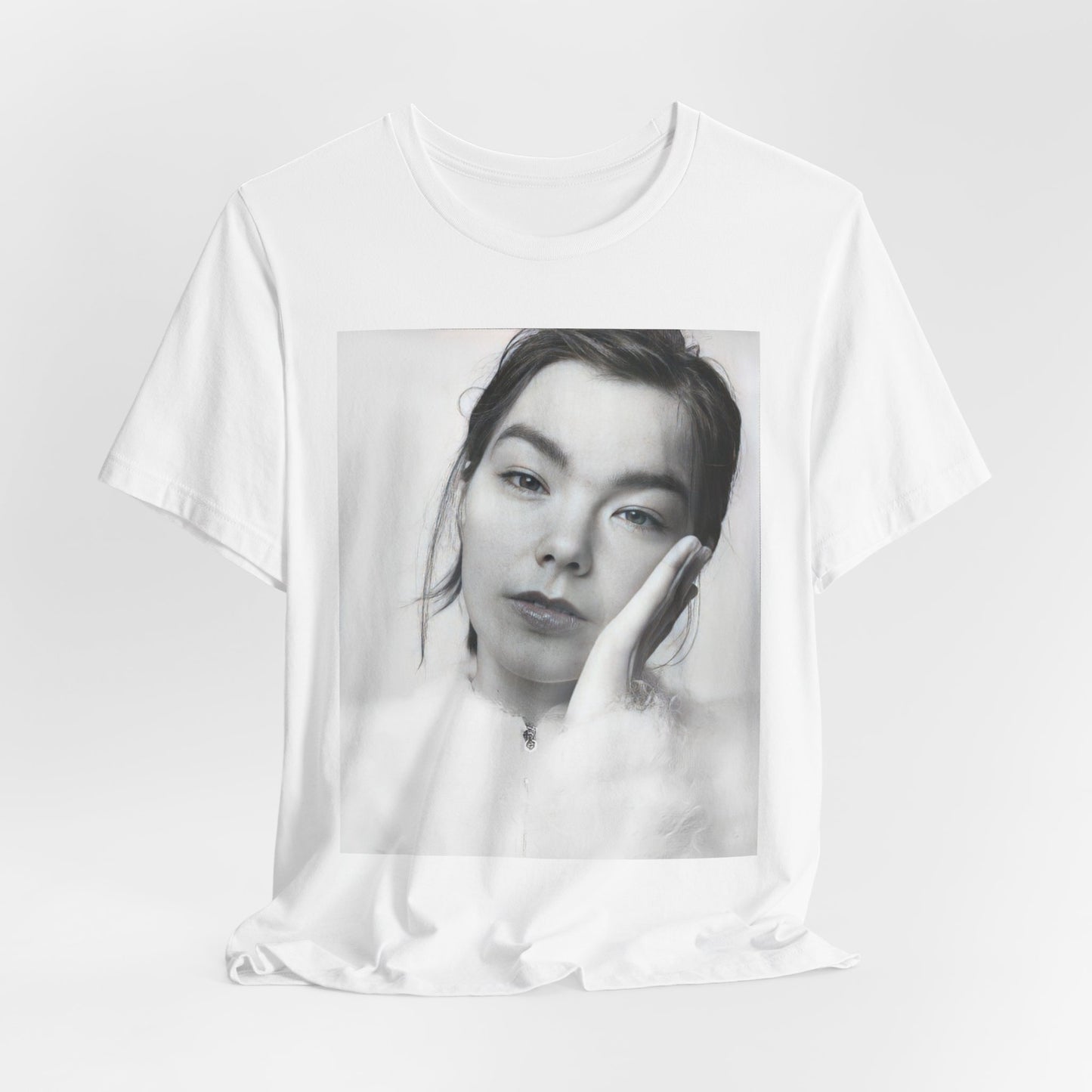 A black graphic t-shirt featuring a graphic related to Bjork's 'Post' album era, possibly with album art elements.