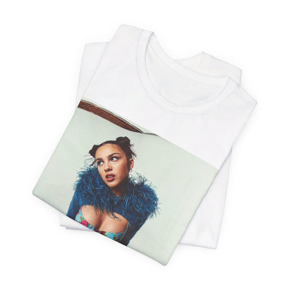 A black graphic t-shirt featuring a graphic of Olivia Rodrigo with 'teen angst vibes'.