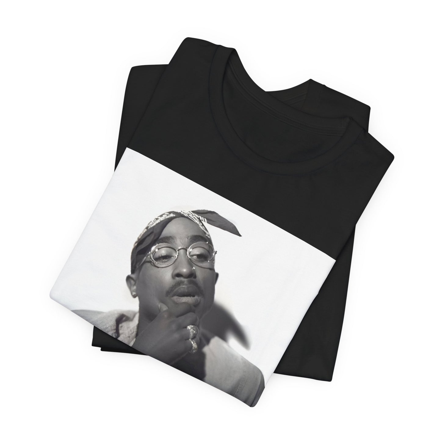 A black graphic t-shirt featuring a classic 90s West Coast rap graphic of Tupac.