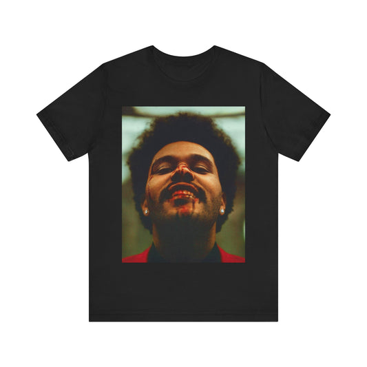 A black graphic t-shirt featuring the album cover art for The Weeknd's 'After Hours'.