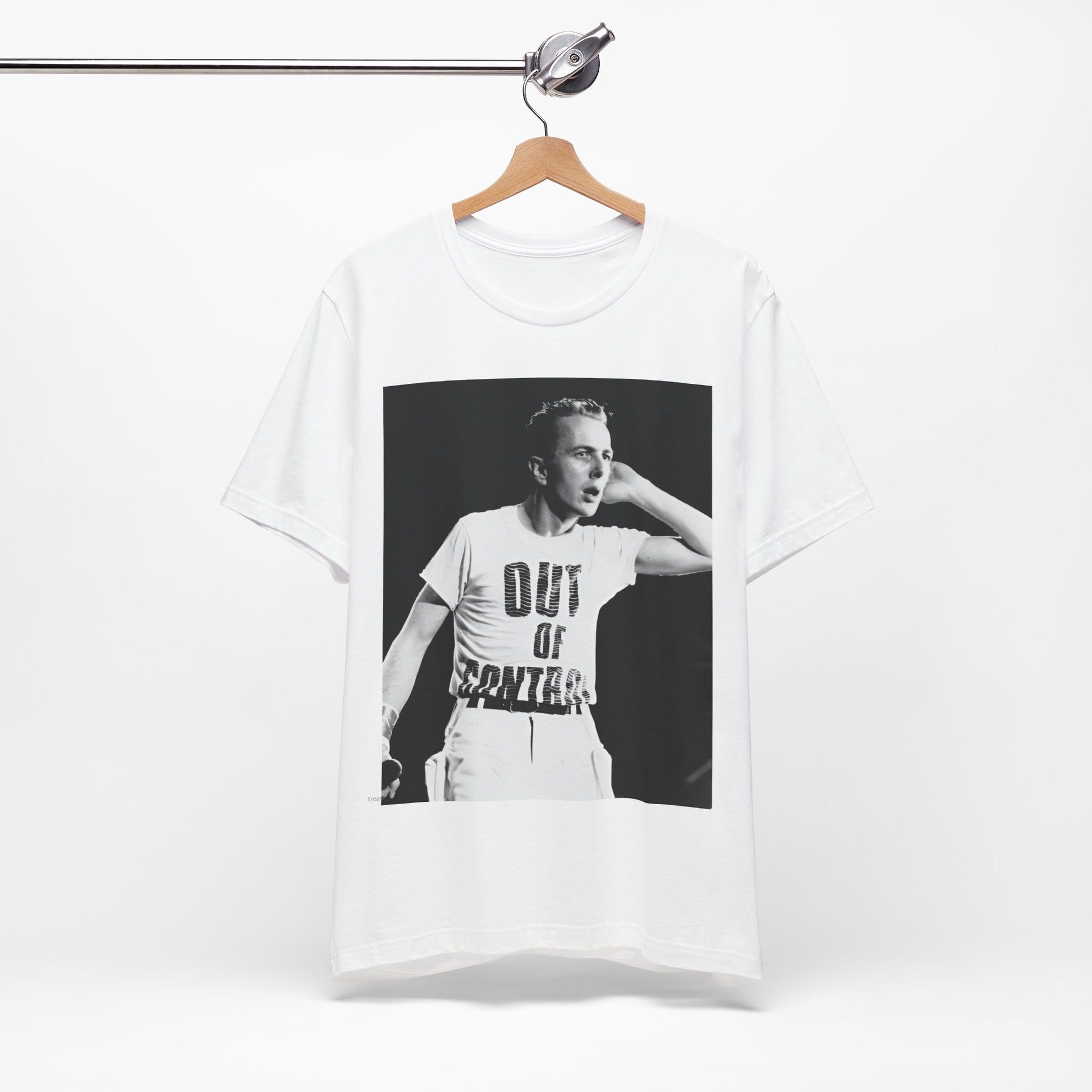 A black graphic t-shirt featuring a black and white graphic or photo portrait of Joe Strummer from The Clash.